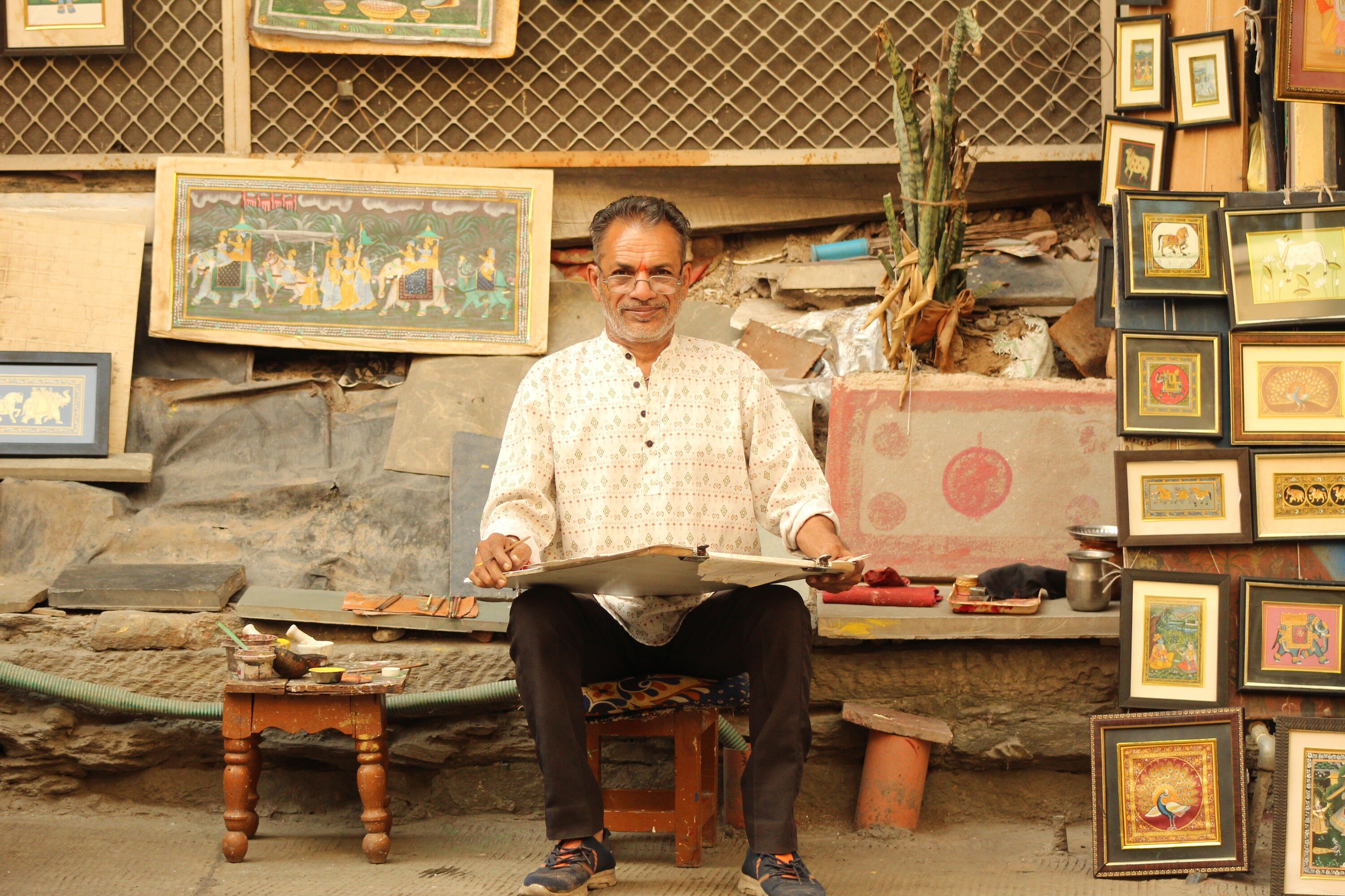 Lalit with some of his work.